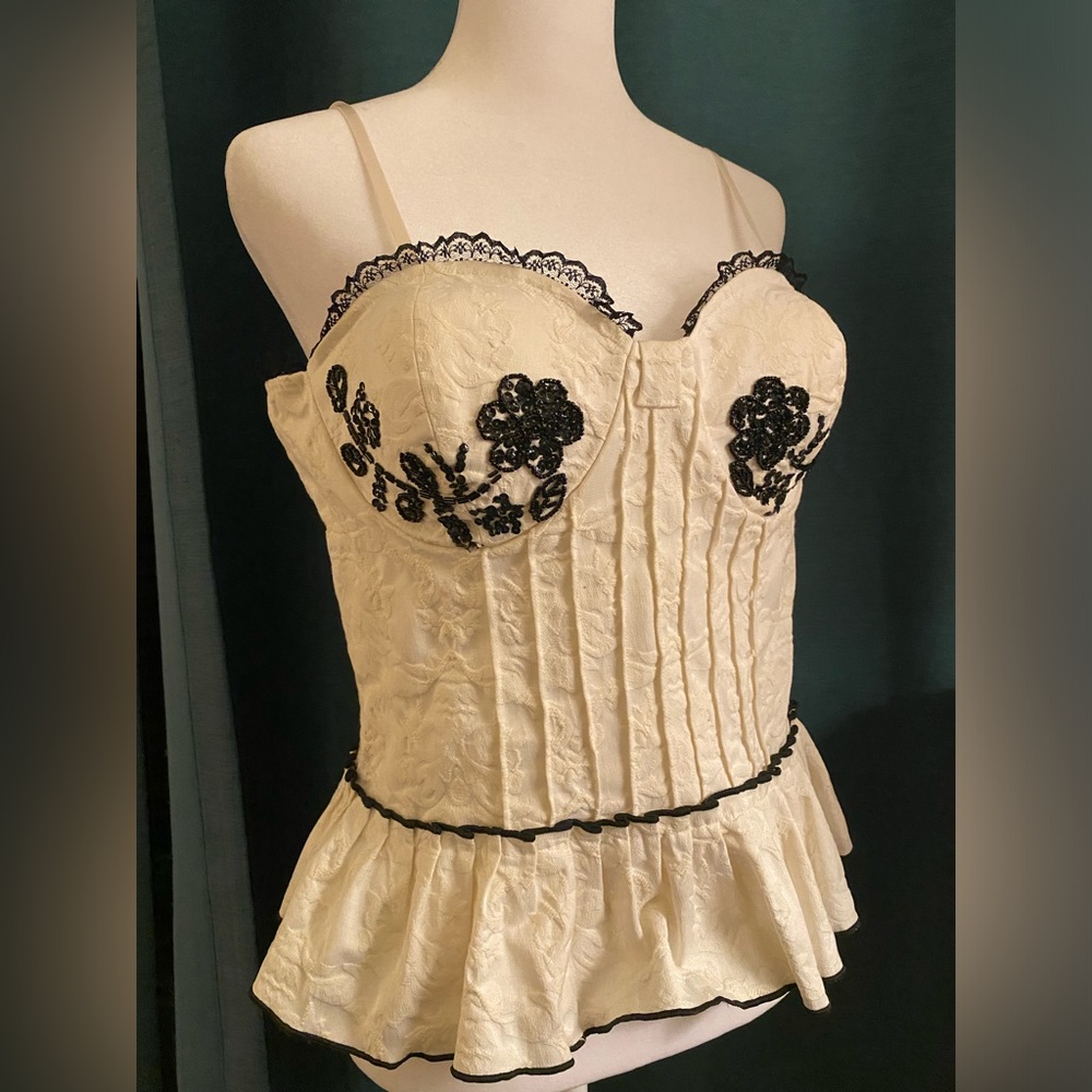 White corset top with smocked back, black beading, and flared bottom Sz L